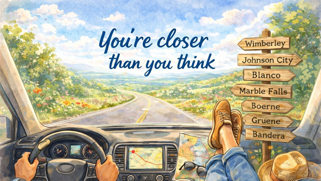 Watercolor illustration of a Texas Hill Country road trip viewed from inside a car, with a winding road, wildflowers, and signs pointing to Wimberley, Johnson City, Blanco, Marble Falls, Boerne, Gruene, and Bandera